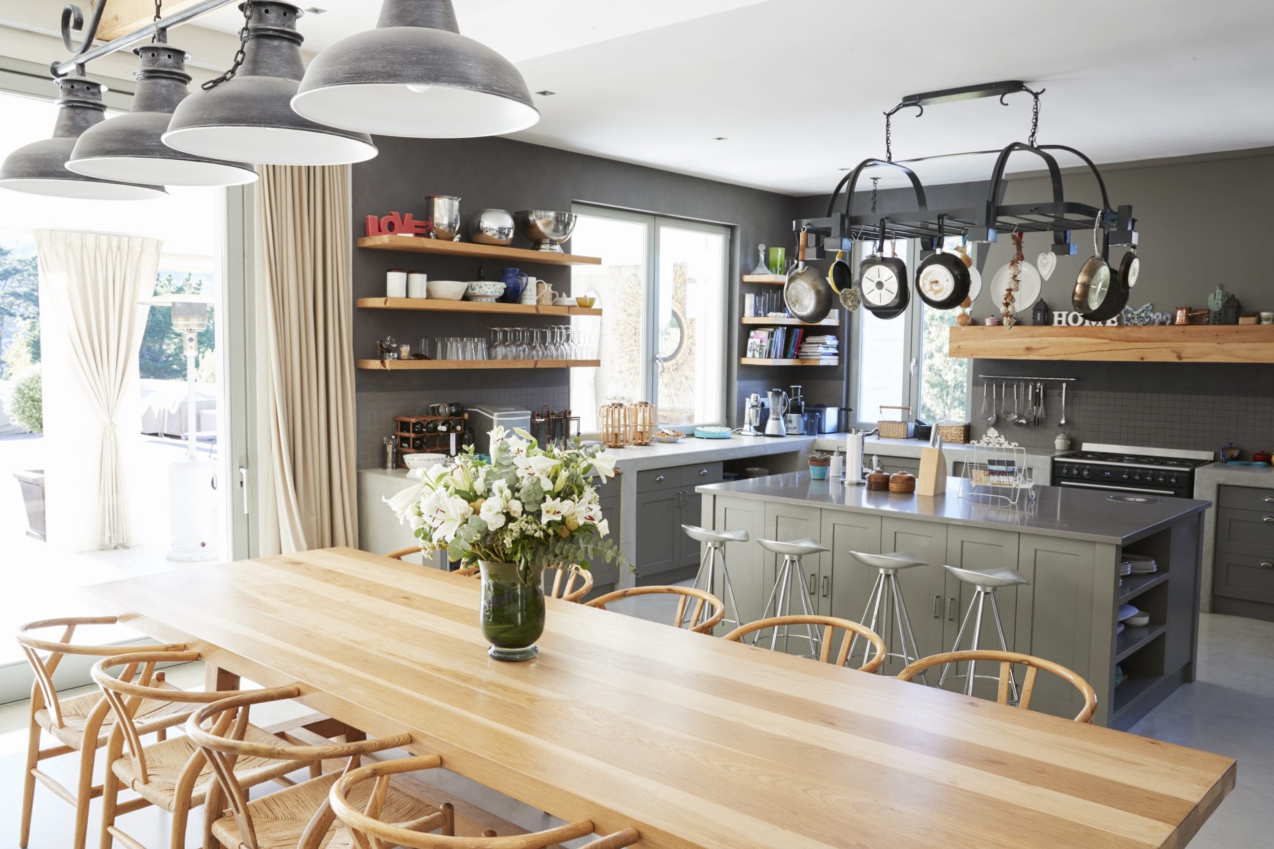home interior with open plan kitchen and dining area