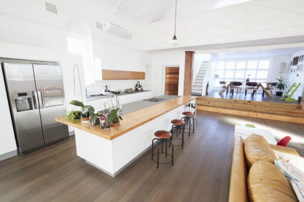 home interior with open plan kitchen and dining area